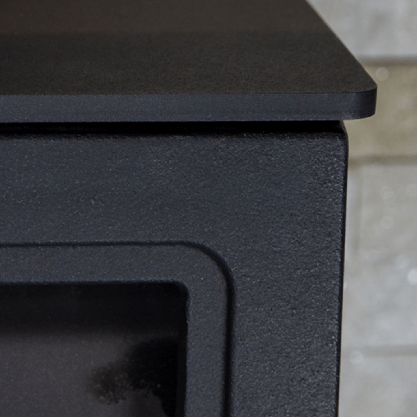 Close-up of a black metal Wood Burning Stove