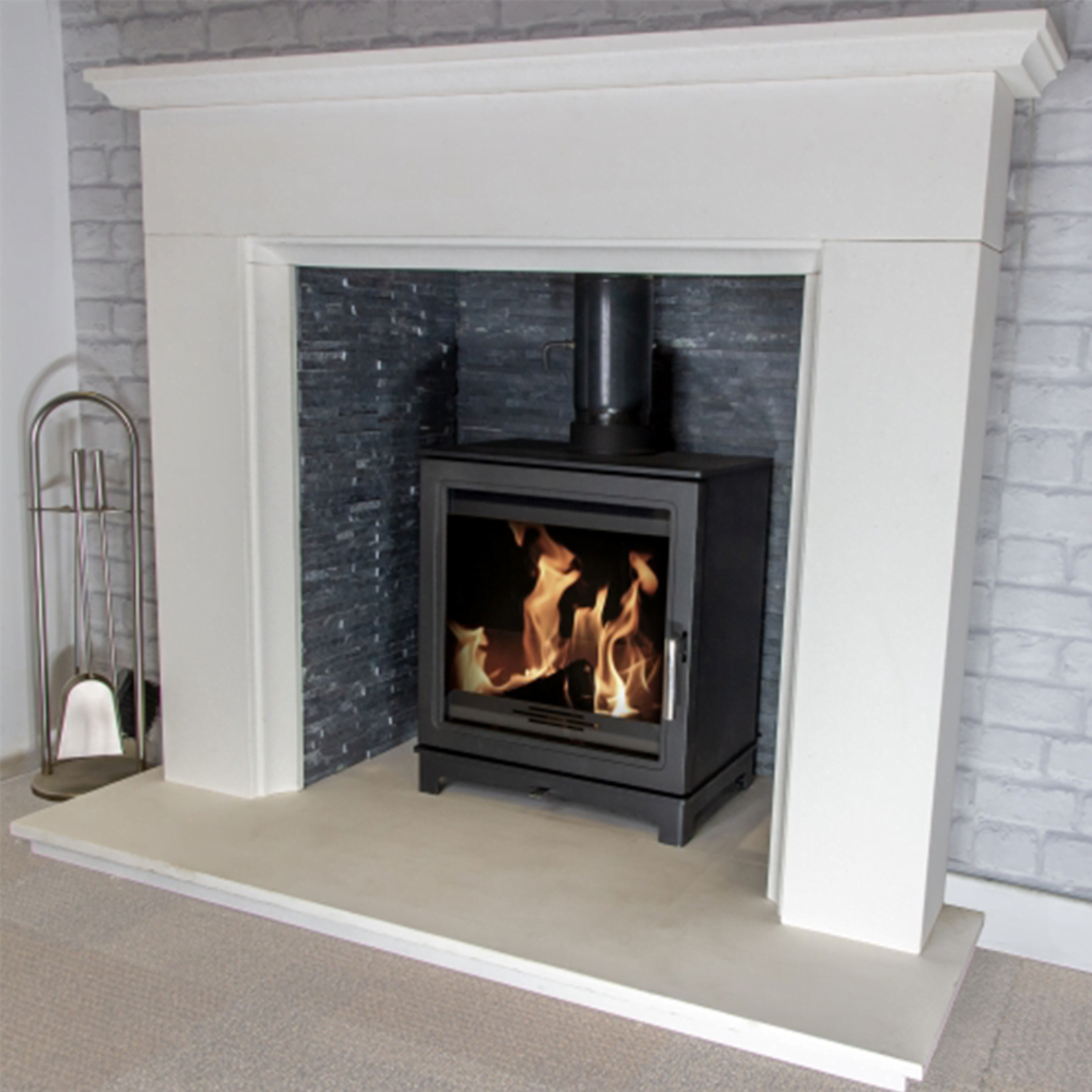 Wood-burning stove in a white fireplace 