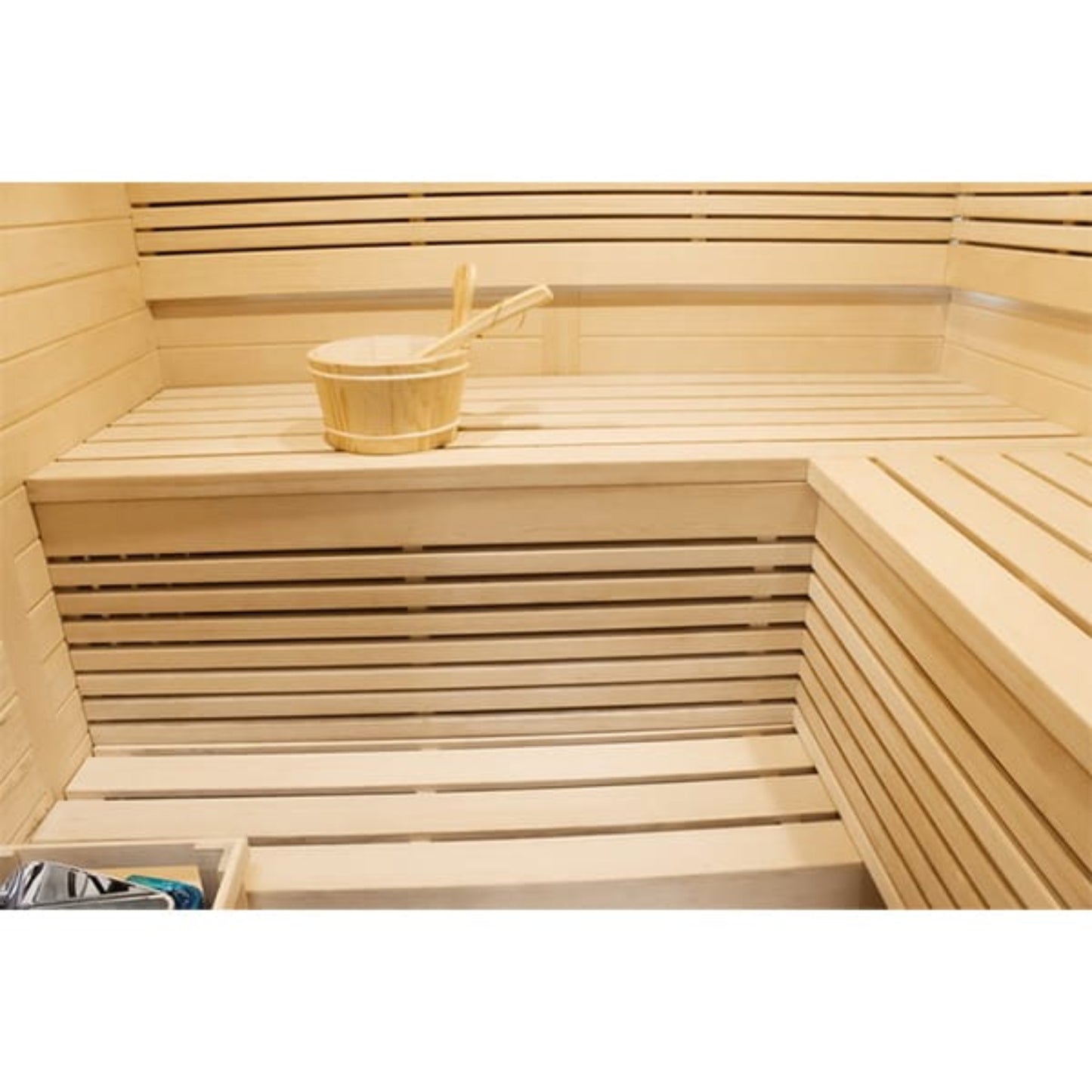 Wooden sauna interior with a bucket 