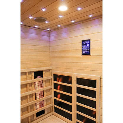 Infrared sauna with wooden walls and ceiling, featuring a control panel.