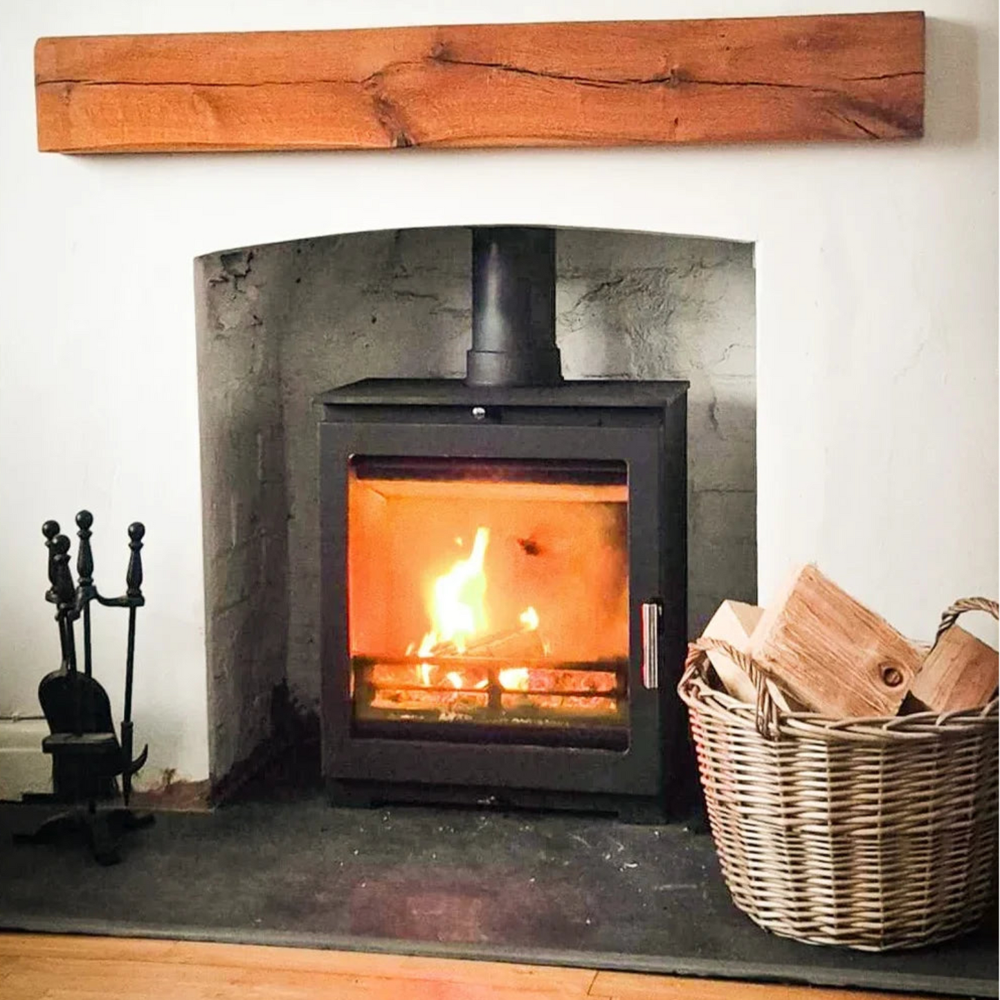 Wood-burning stove with fire lit