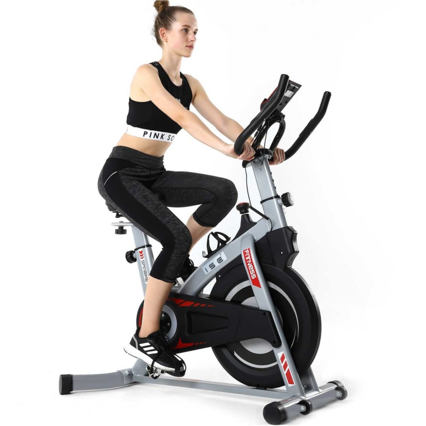 Woman exercising on a Magnetic Indoor Exercise Bike with 8kg Flywheel