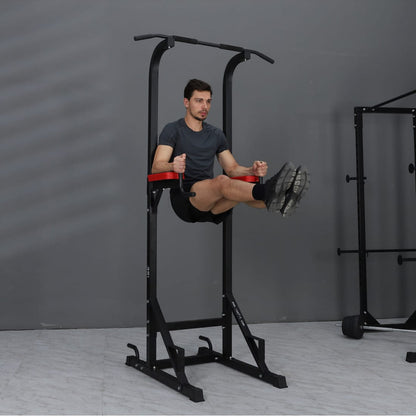 Person using a black and red pull-up bar station 